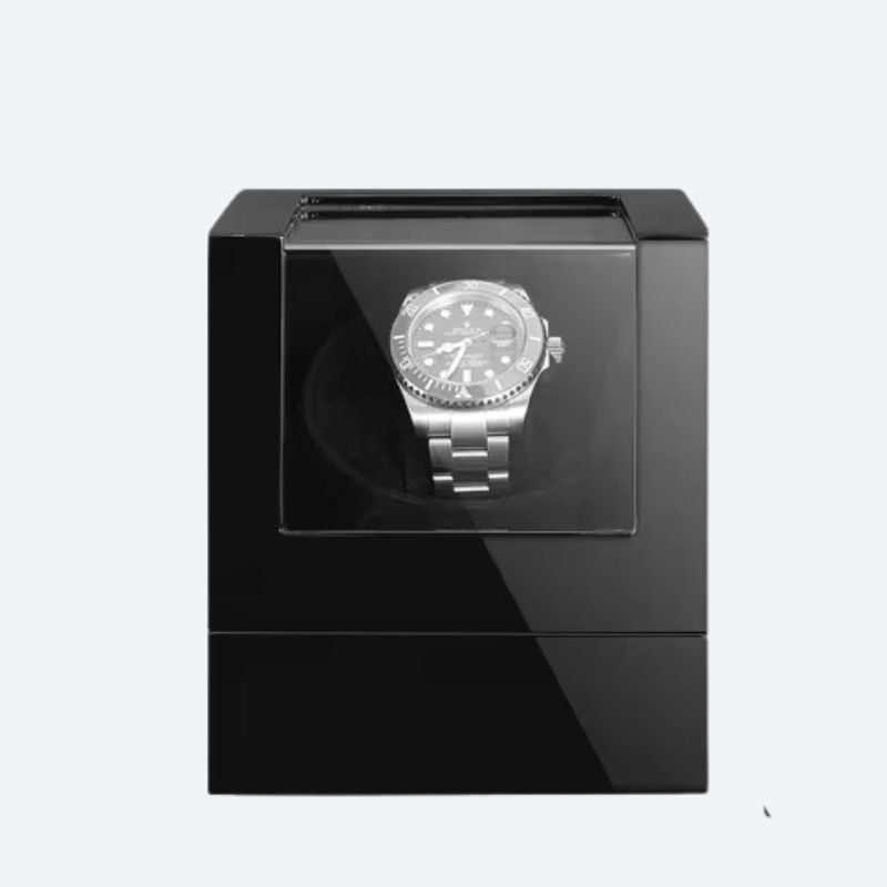 Boîte à montres avec remontoir, module rotatif visible