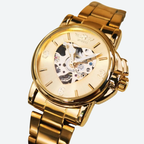 Montre automatique femme squelette dorée bracelet acier, vue de face