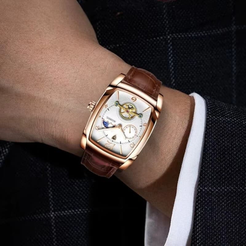 Boîtier tonneau or rose de la montre automatique homme