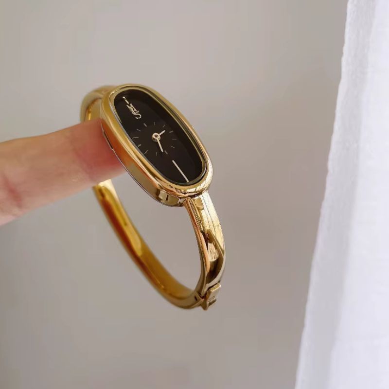 Montre Femme Jonc Doré Cadran Noir Ovale Résistante à l’Eau - vue 3 - Montrelio