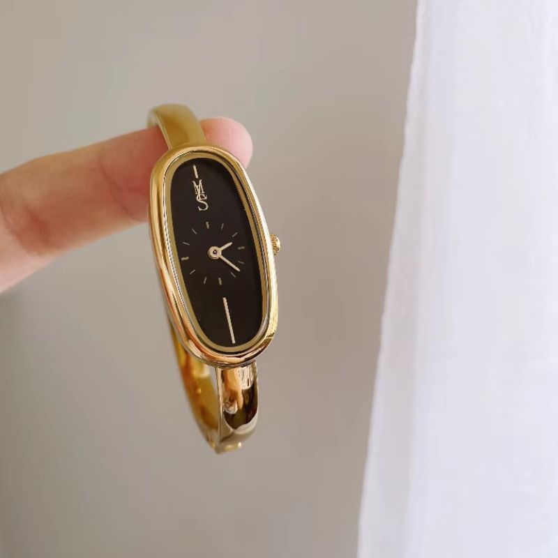 Montre Femme Jonc Doré Cadran Noir Ovale Résistante à l’Eau - vue 5 - Montrelio
