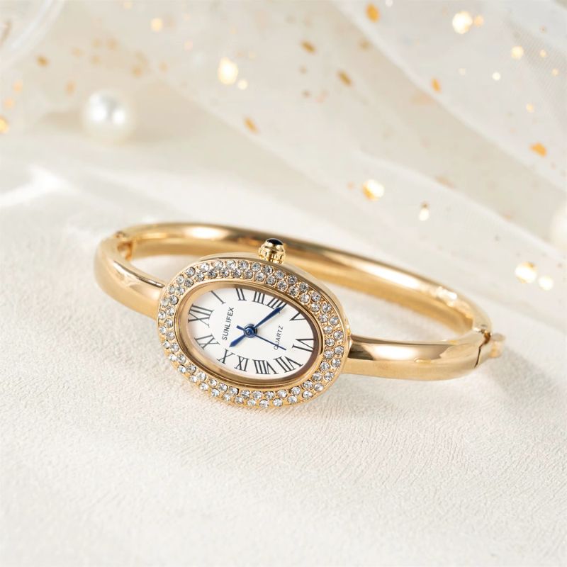 Montre Femme Ovale Dorée Strass Cadran Chiffres Romains Quartz - vue 2 - Montrelio