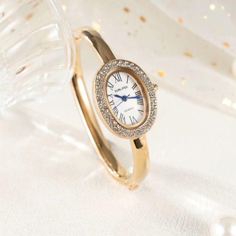 Montre Femme Ovale Dorée Strass Cadran Chiffres Romains Quartz - vue 3 - Montrelio